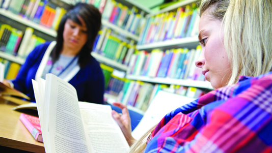 Students studying in a library