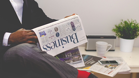 Man with newspaper