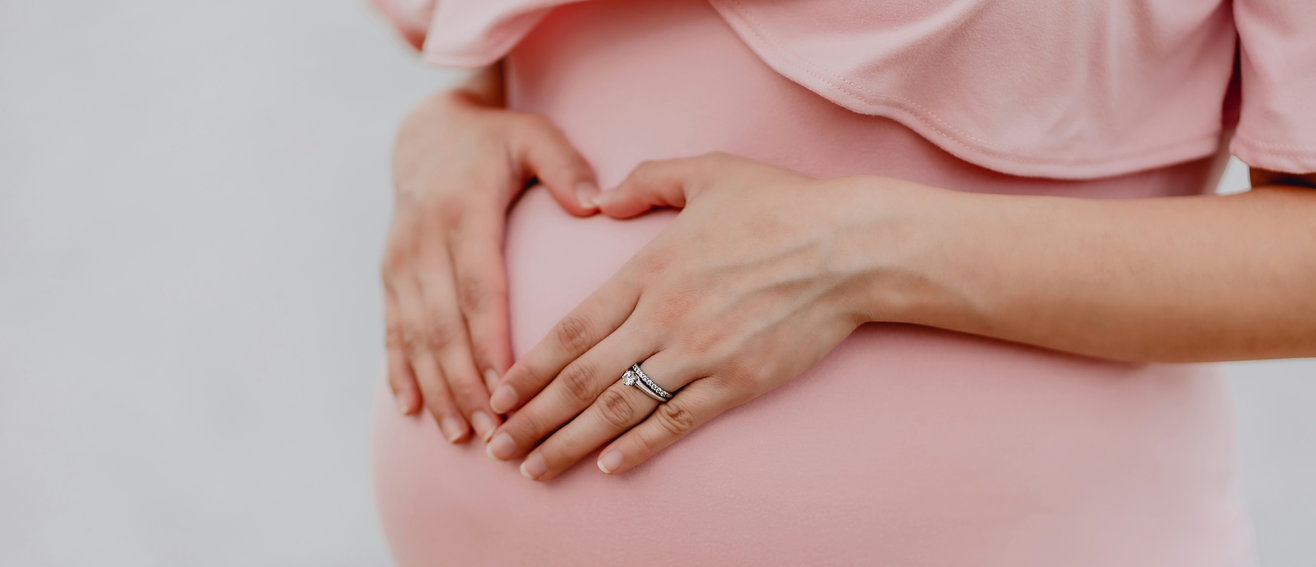 woman-pregnant-bump-1316x567.jpg