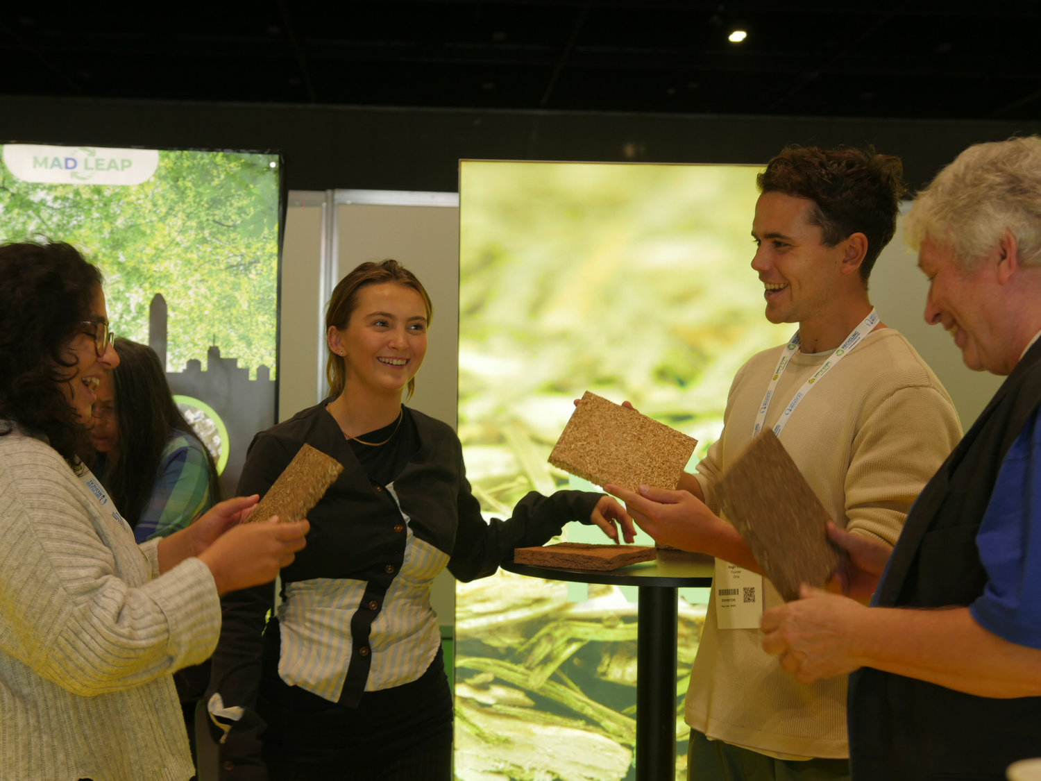 A group of people looking at construction materials