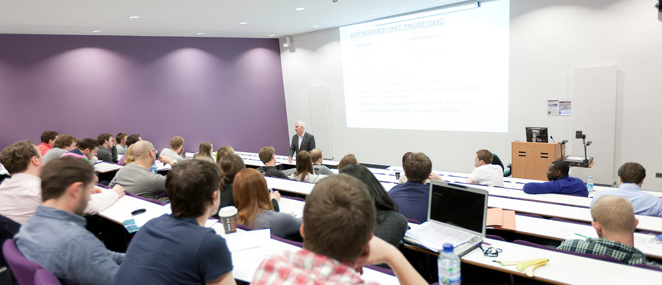 multiple students listening to a lecture