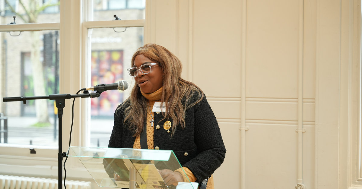 Cllr Marcia Cameron speaking into a microphone