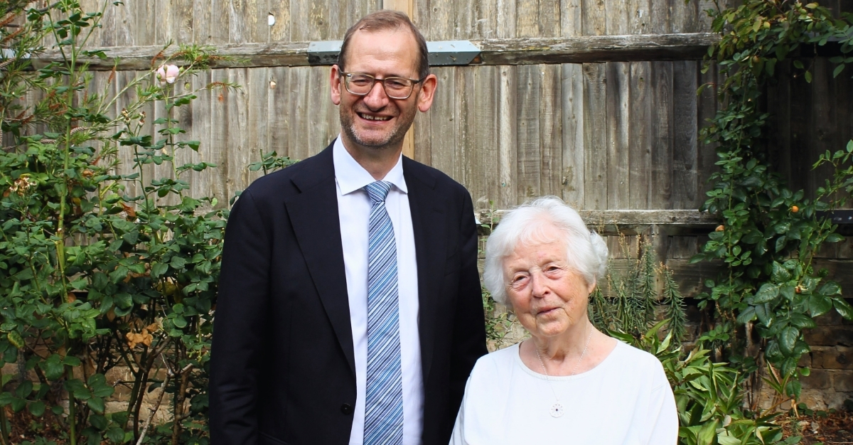 Paul Kett and Dr Agnes Kaposi stand together in a garden