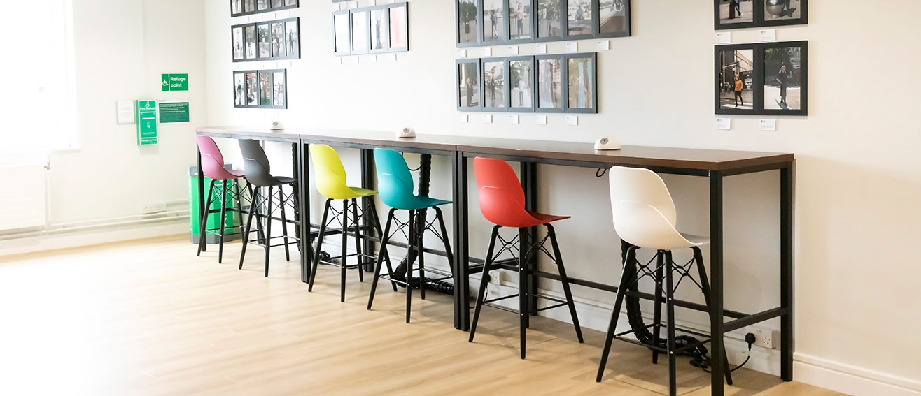 a row of multicoloured chairs