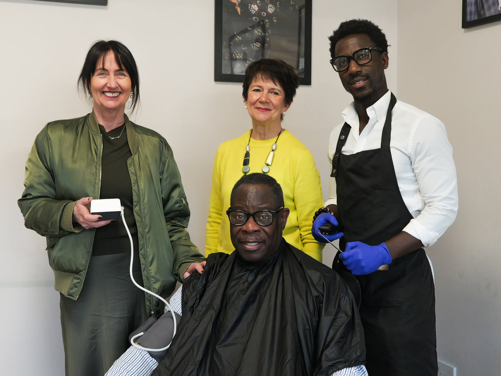 A group of people look at the camera
