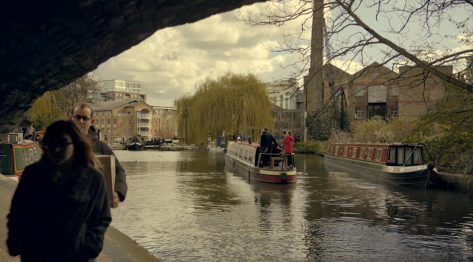 people at a busy canal