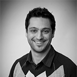 man smiles in headshot