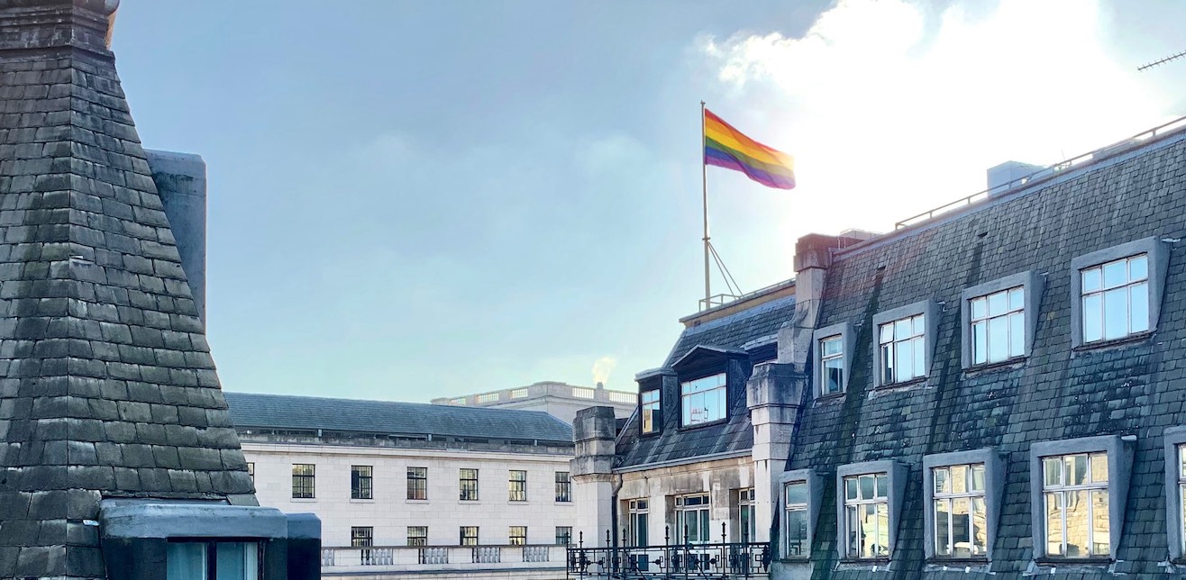 rainbow flag on sunny day on building