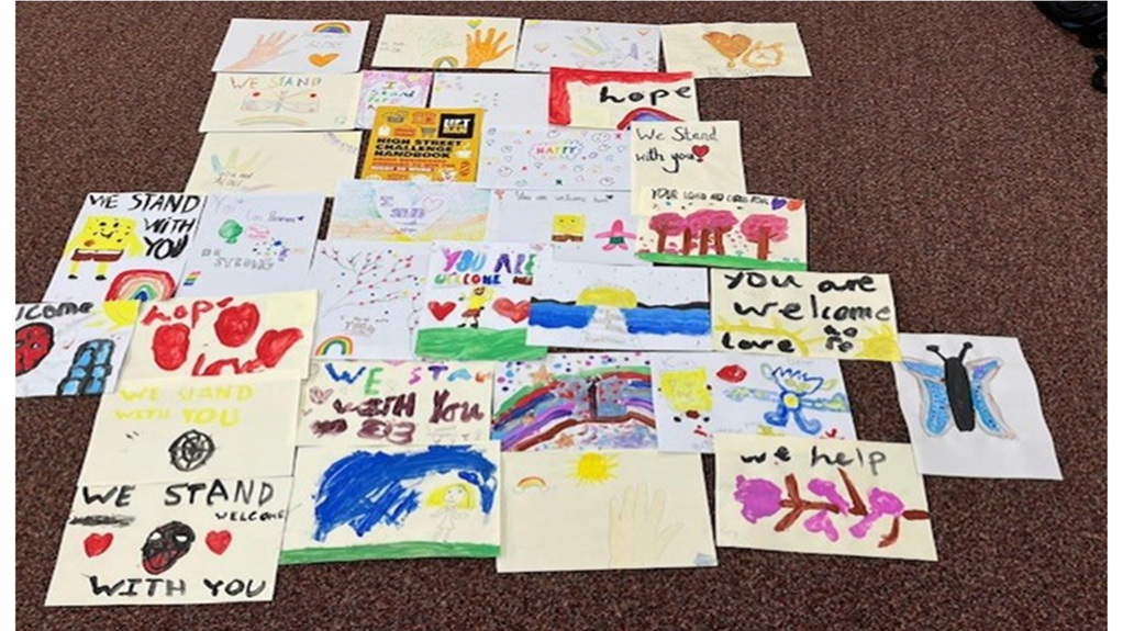 Artwork by children relating to schools of sanctuary. 