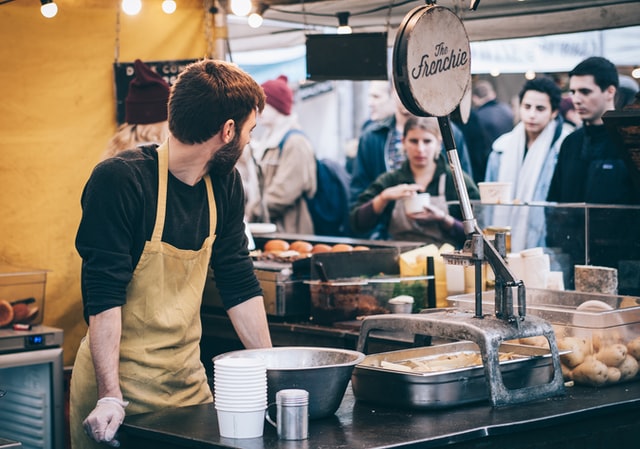 Frenchie at SC Foodmarket man at kitchen