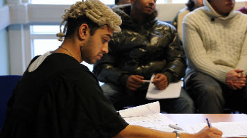 College students in mock trial for legal awareness